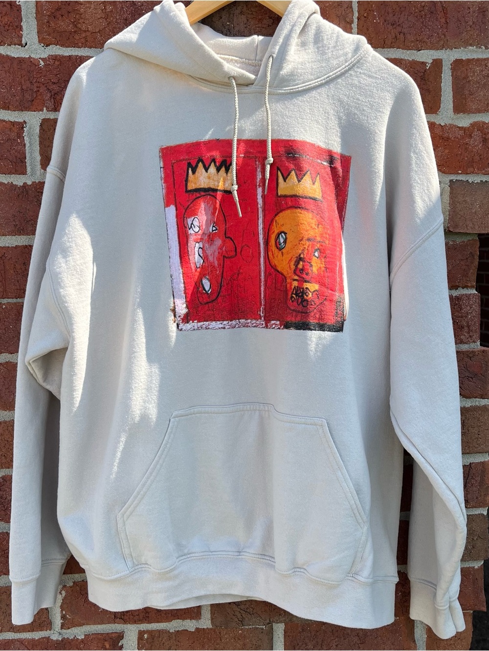 Cream Pullover Hoodie with Red Graphic Crown Panel
